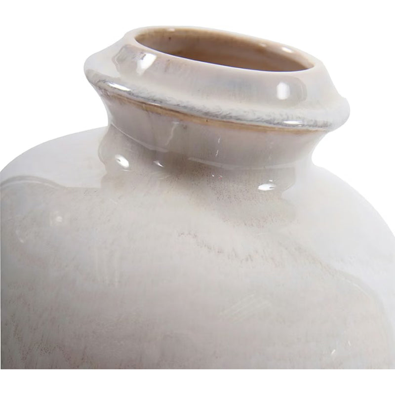 Close-up of a ceramic vase with a smooth, glossy finish on a white background