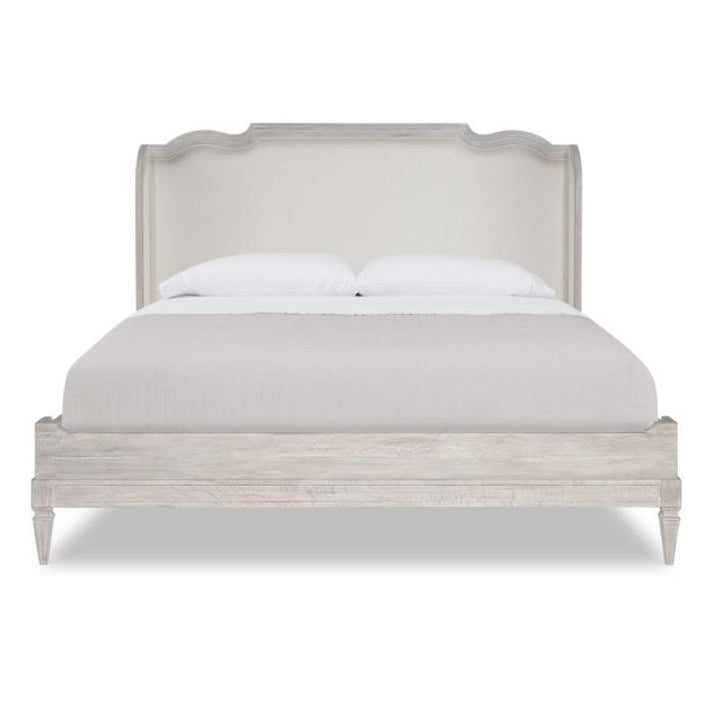 Bed with linen bedding on a white background